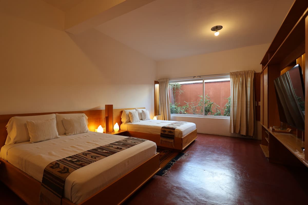 classic quadruple room | premium bedding, down duvets, in-room safe, individually decorated