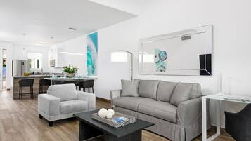 Deluxe Condo, 2 Bedrooms, Kitchen, Marina View | Living area | 70-inch Smart TV with cable channels, TV