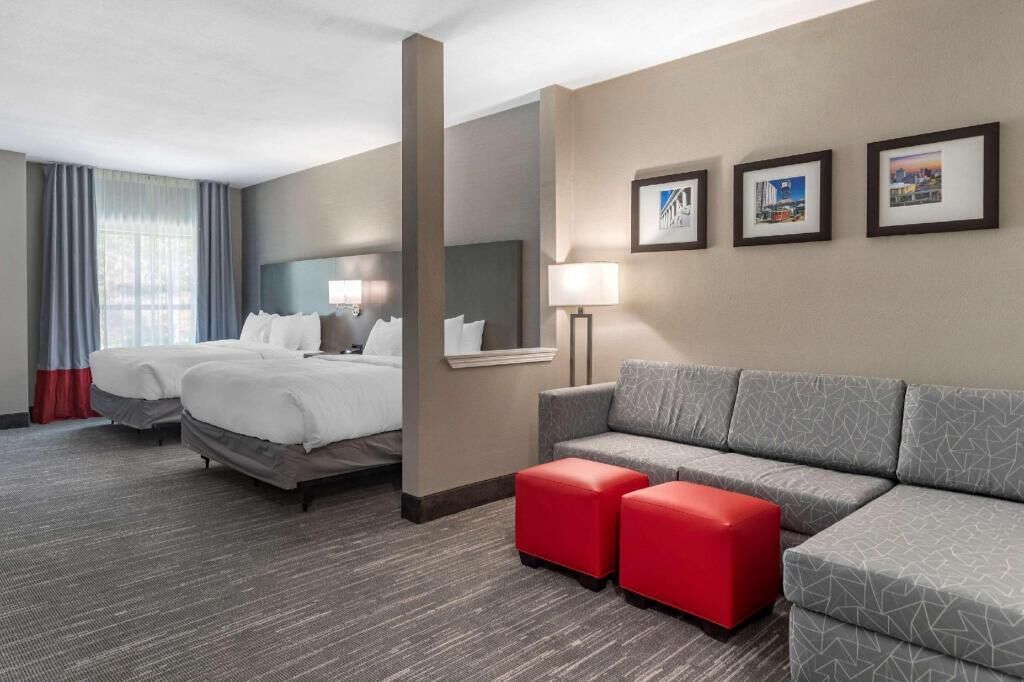 Premium bedding, desk, laptop workspace, soundproofing