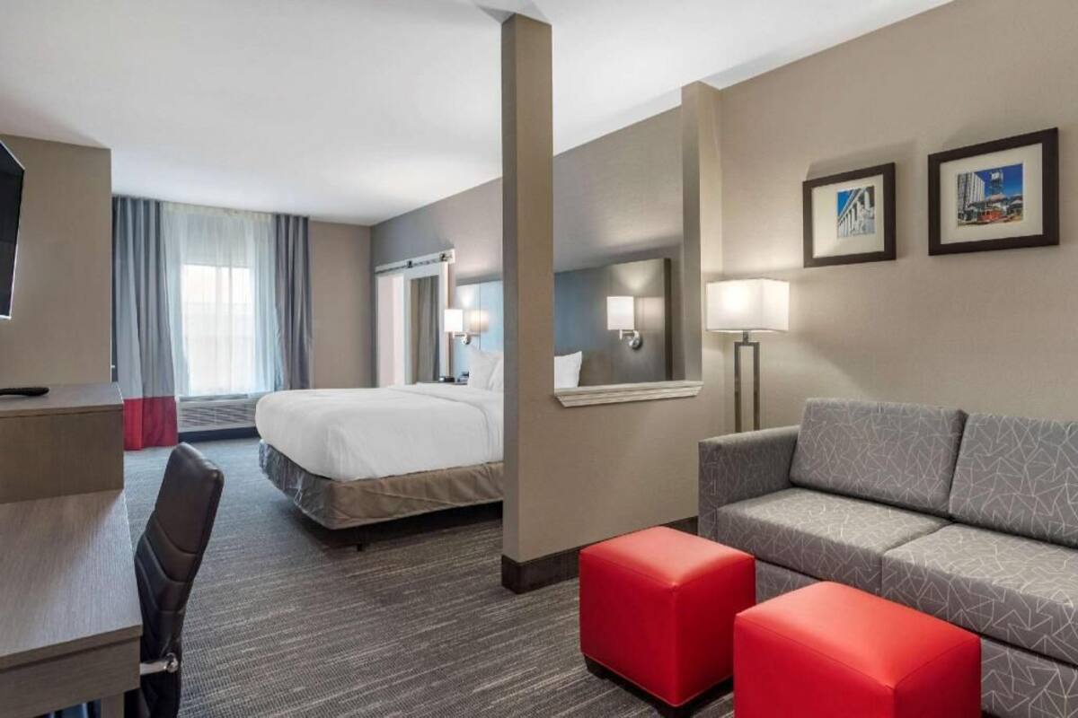 Premium bedding, desk, laptop workspace, soundproofing