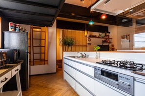 Fridge, microwave, stovetop, cookware/dishes/utensils