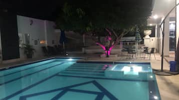 Outdoor pool, pool umbrellas, pool loungers