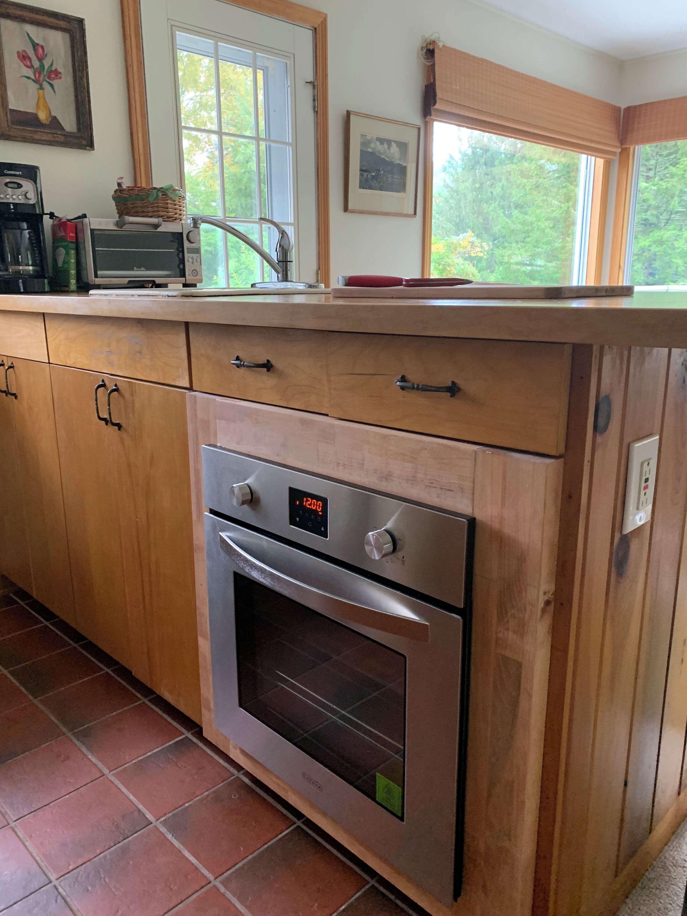 Fridge, microwave, coffee/tea maker, cookware/dishes/utensils