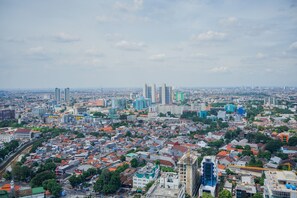 Room | View from room - Chic and Cozy 2BR Apartment at Menteng Park (Jakarta)