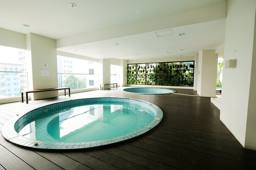 Pool View 2BR Apartment at Capitol Park Residence