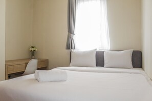 Room | 2 bedrooms, free WiFi, bed sheets - Homey 2BR Apartment at Grand Palace Kemayoran (Jakarta)