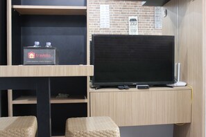 Room | Television - Modern 2BR Apartment at Grand Asia Afrika Residence (Bandung)