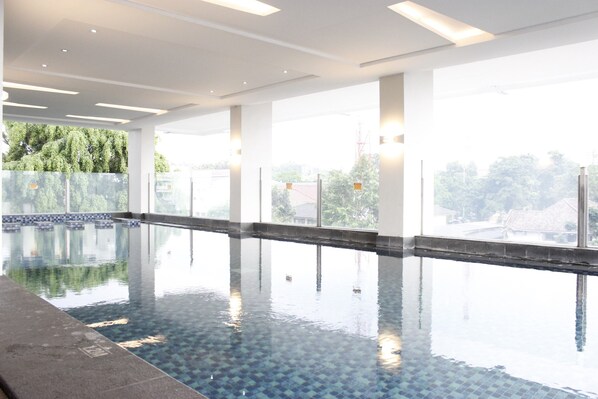 Outdoor pool - Cozy 2BR Apartment at Tamansari Tera Residence near BIP (Bandung)