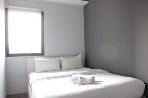 Room | 2 bedrooms, free WiFi, bed sheets - Modern Deluxe 2BR at Braga City Walk Apartment (Bandung)