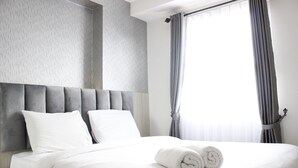 Room | 2 bedrooms, free WiFi, bed sheets - Bright & Stylish 2BR at Gateway Pasteur Apartment (Cimahi)