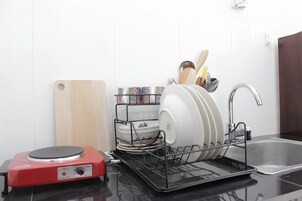 Fridge, stovetop, cookware/dishes/utensils