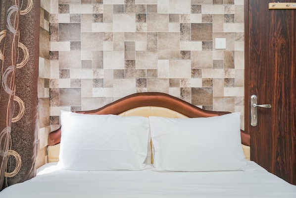 Chambre | 1 chambre, accès au Wi-Fi (inclus), literie fournie