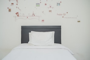 Room | Free WiFi, bed sheets - Chic Studio Apartment at Akasa Pure Living BSD (South Tangerang)
