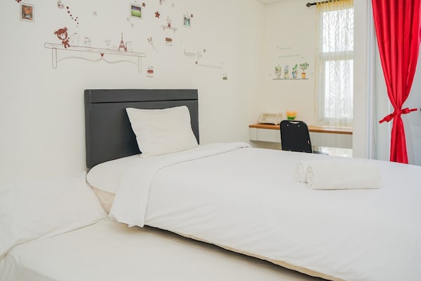Room | Free WiFi, bed sheets - Chic Studio Apartment at Akasa Pure Living BSD (South Tangerang)