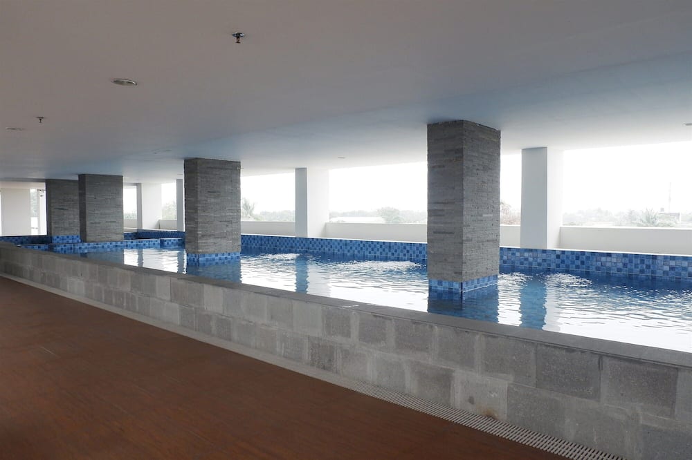 Minimalist Studio Apartment at Poris 88 with City View