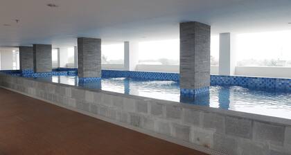 Minimalist Studio Apartment at Poris 88 with City View