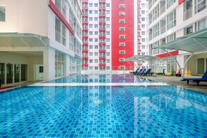 Outdoor pool - Cozy Stay Apartment @ 1BR Grand Taman Melati 2 (Depok)