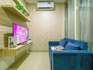 Habitación | Zona de estar | Una televisión