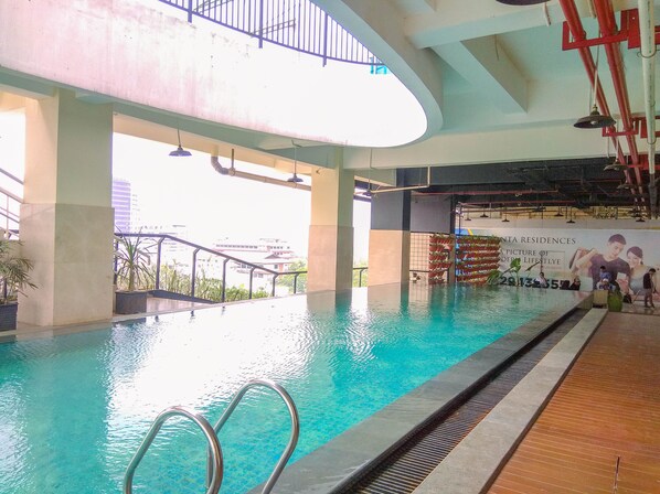 Outdoor pool - Cozy and Elegant 1BR @ Atlanta Residences (Depok)
