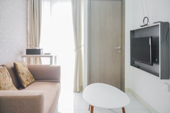 Room | Living room | TV - Minimalist 2BR at Emerald Bintaro Apartment (South Tangerang)