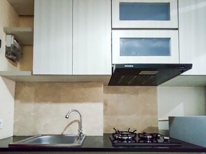 Private kitchenette - New Furnished & Modern @ Studio Tamansari Mahogany Karawang Apartment (Karawang)