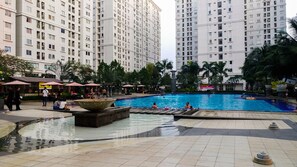 Outdoor pool - Stunning 2BR Apartment at Green Palace Kalibata (Jakarta)