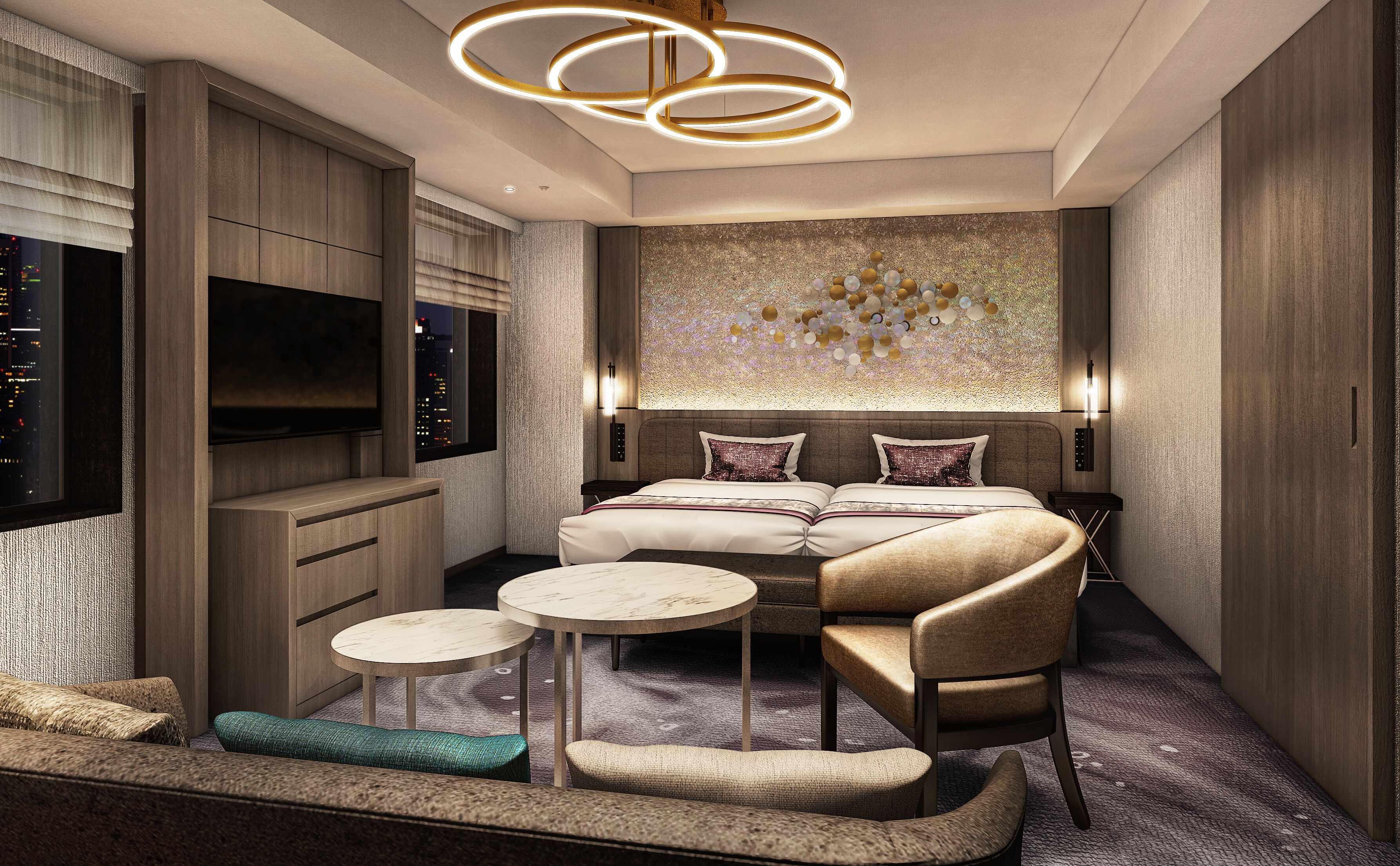 A modern bedroom with a large bed, two side tables, a sofa, and a TV.