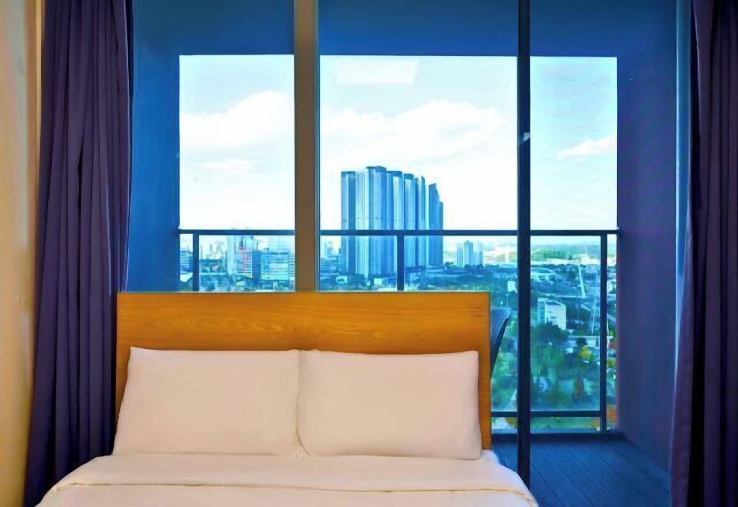 Desk, laptop workspace, blackout drapes, soundproofing