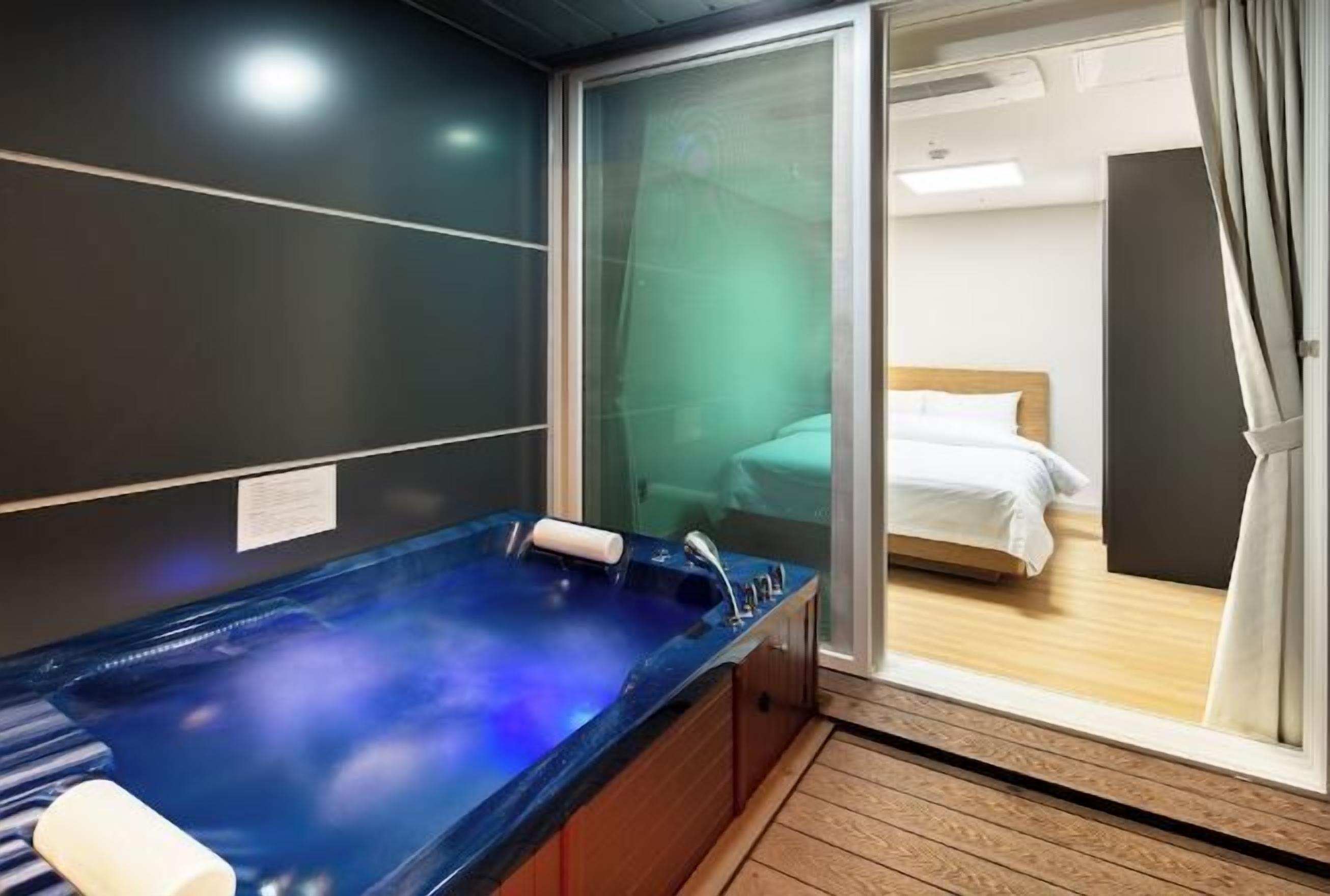 Desk, laptop workspace, blackout drapes, soundproofing