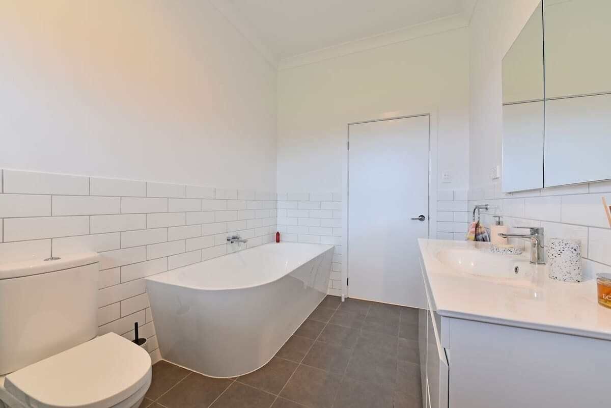 Bathtub, hair dryer, shampoo
