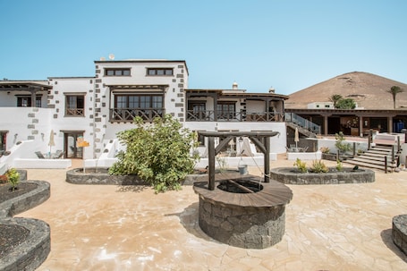 Exterior. Charming Apartment "1" with Terrace, Community Pool & Wi-Fi