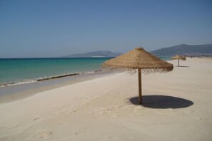 Sillas reclinables de playa, toallas de playa