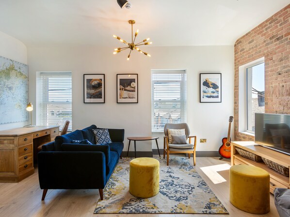 Luxury Penthouse | Living area | 32-inch Smart TV with cable channels, TV, Netflix