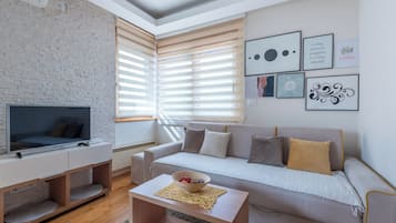 Royal Apartment | Living room | 32-inch LCD TV with cable channels, TV