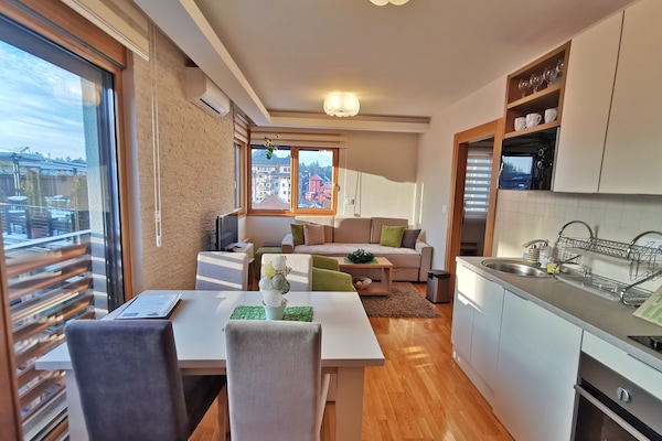 Superior Apartment | Living area | 32-inch LCD TV with cable channels, TV