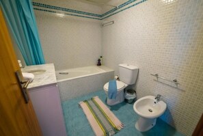 Shower, hair dryer, bidet, toilet paper