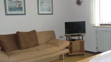 Apartemen | Area keluarga | Televisi layar datar 50-inci dengan saluran TV kabel dan TV