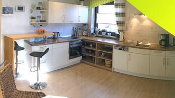 Apartment | Private kitchen | Microwave, oven, stovetop, dishwasher