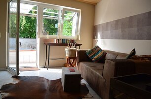 Apartment, 1 Bedroom, Balcony | Living area | 20-inch TV with satellite channels