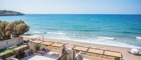 On the beach, sun-loungers, beach towels