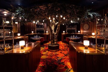 5 bars/lounges, poolside bar