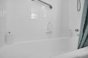 Combined shower/tub, hair dryer, towels, soap