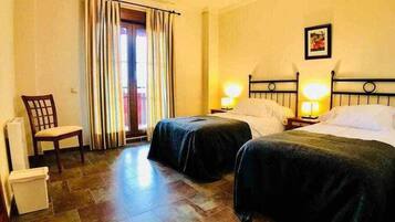 2 dormitorios, tabla de planchar con plancha, wifi gratis y ropa de cama