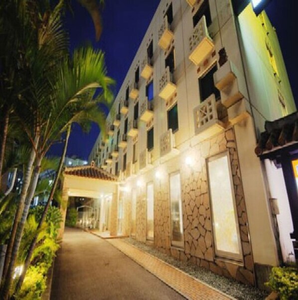Enter a tropical haven with a unique blend of modern and traditional architecture.