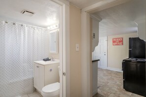 Combined shower/tub, hair dryer, towels, soap