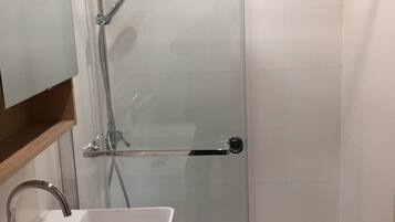 Shower, hair dryer, toilet paper