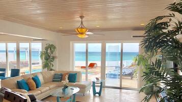 Deluxe Townhome | Living area | 50-inch LCD TV with digital channels, TV