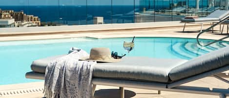 Indoor pool, seasonal outdoor pool, free cabanas, pool umbrellas