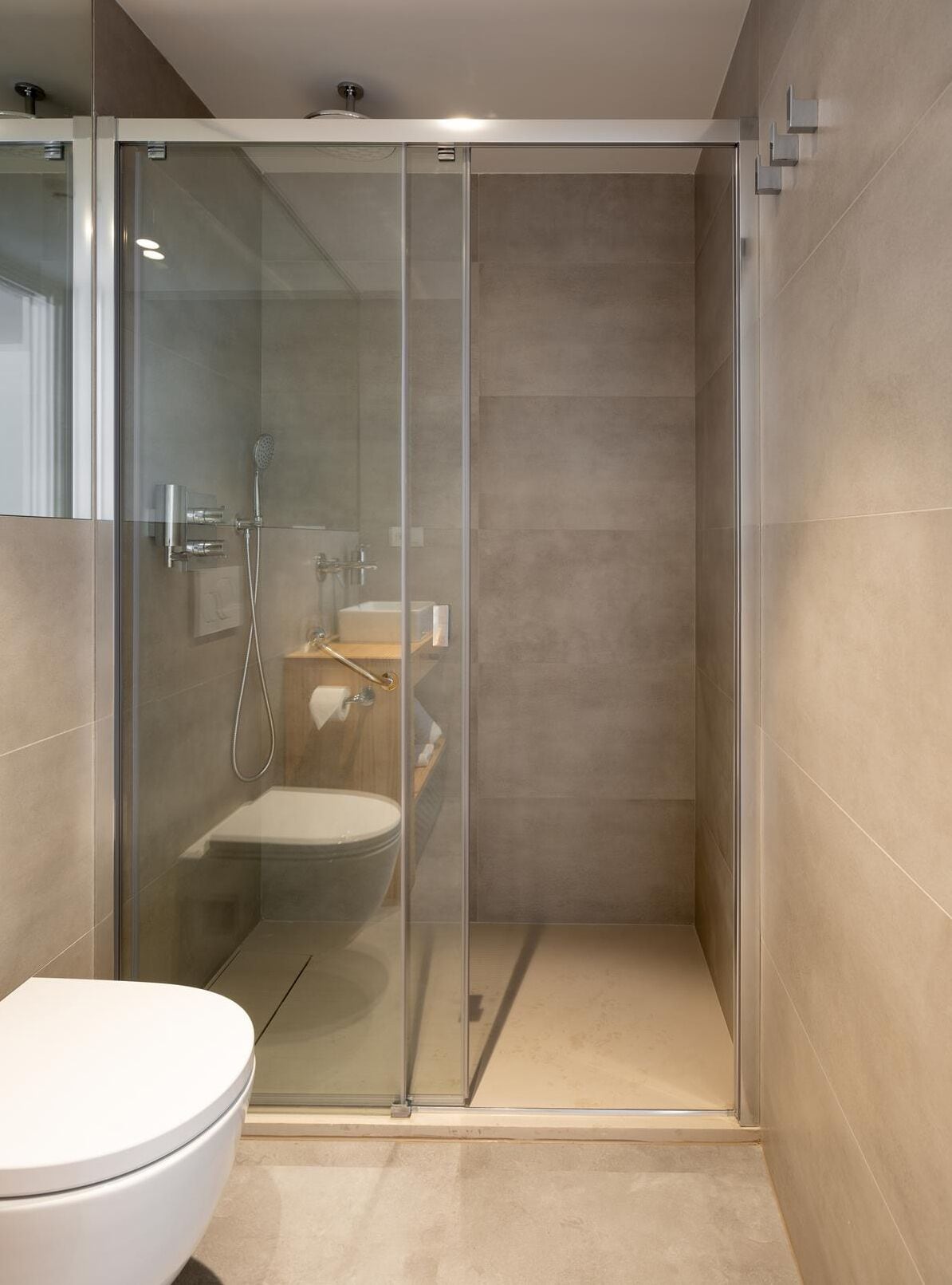 superior double room, city view | bathroom | shower, rainfall showerhead, towels, soap