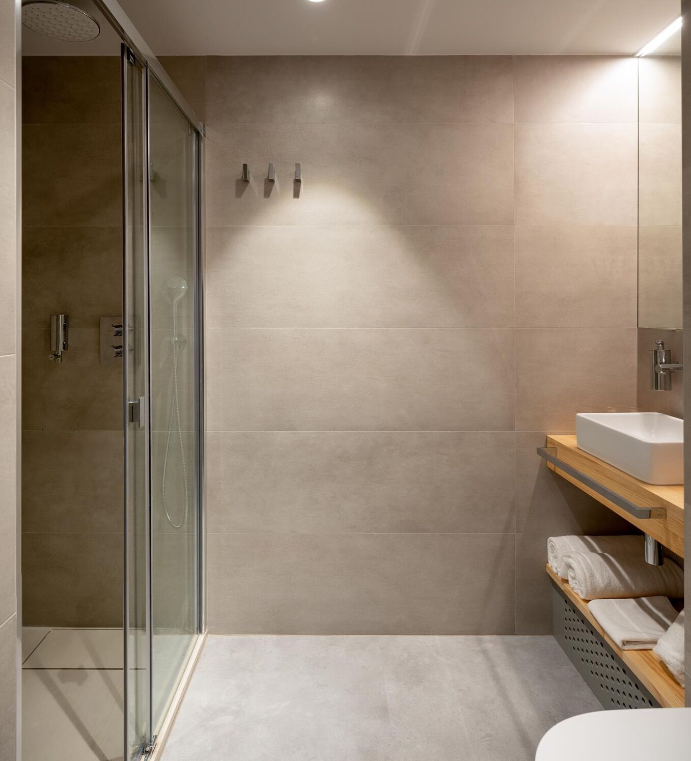 economy double room, courtyard view | bathroom | shower, rainfall showerhead, towels, soap